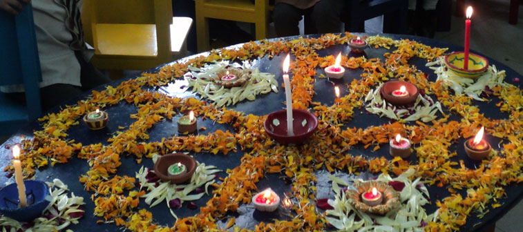 Flowers, earthen lamps, colours and the aromas of Rangoli